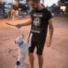 t-shirt-mockup-of-an-edgy-man-playing-with-his-dog-18030-min